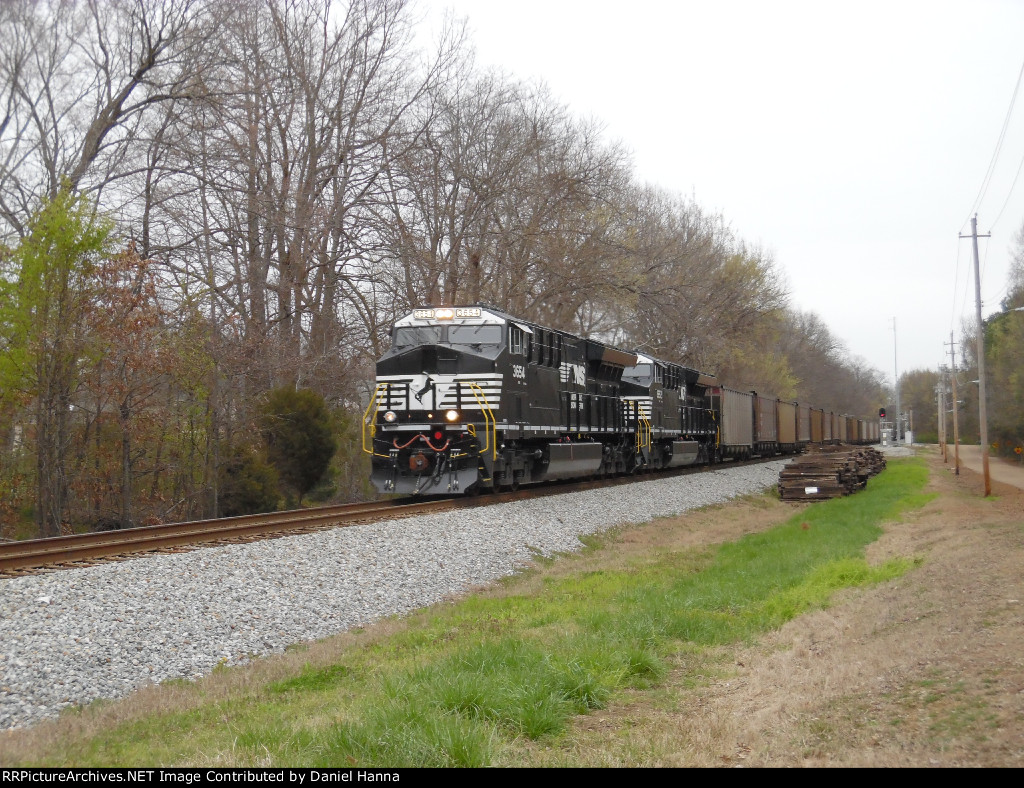 Factory fresh ET44AC's lead an empty coal train west